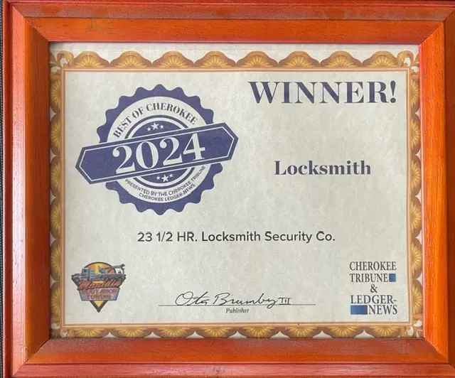 Framed award certificate for "23 1/2 HR. Locksmith Security Co." as the 2024 Locksmith Winner.